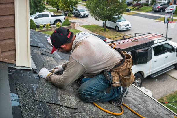 Professional Roofing technician working in Hughsonville, NY